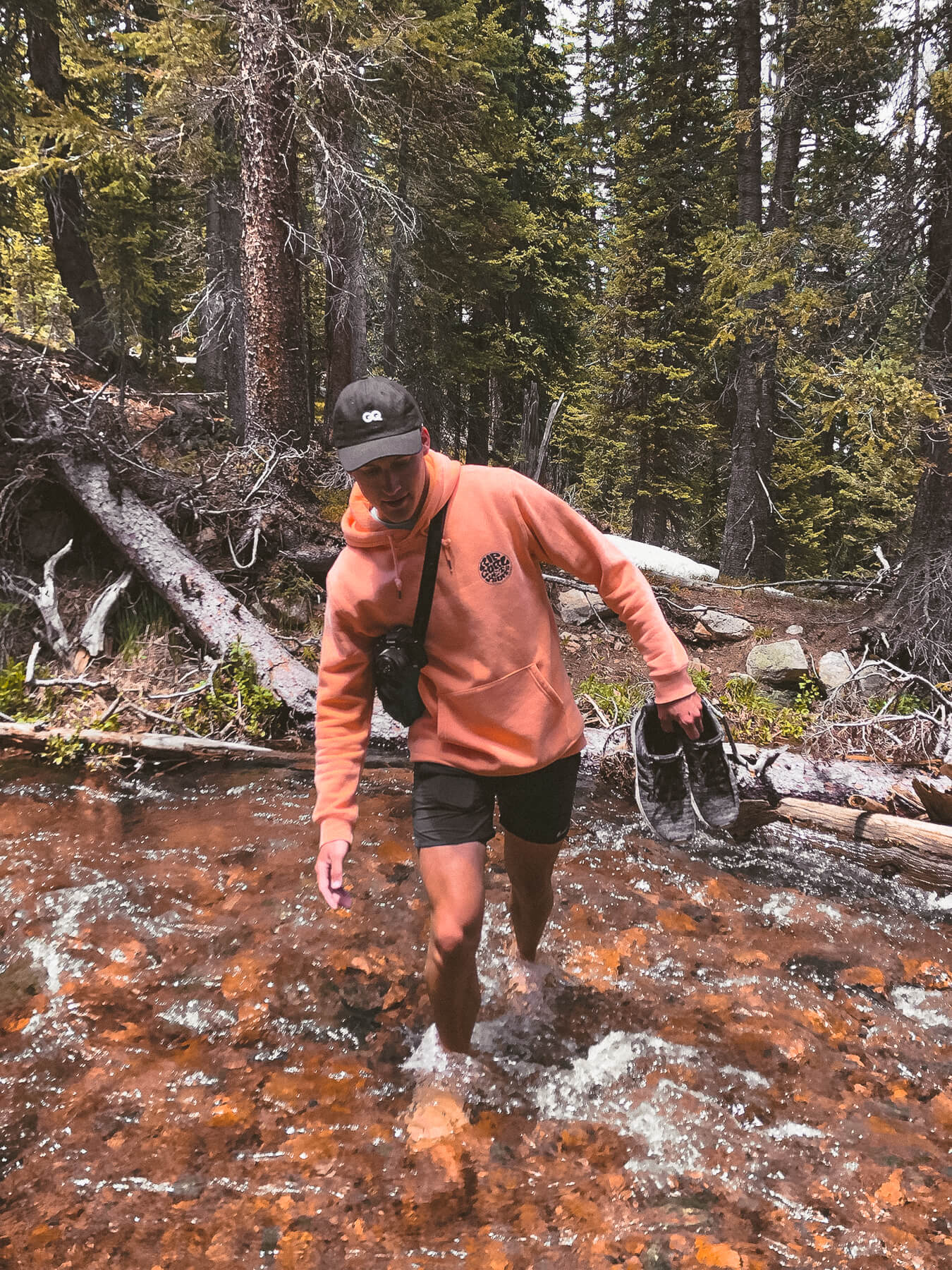 Cade walking through stream